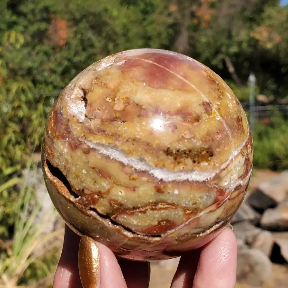 Pink Ocean Ibis Jasper Brecciated Sphere w/ Caves Druzy 458 grams 71mm